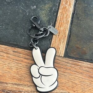Coach White and Black Peace Hand Leather Keychain